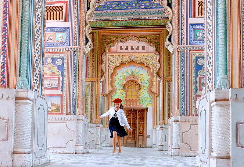 Traditional Rajasthani folk dancers and musicians performing at a cultural heritage venue (Image 48)