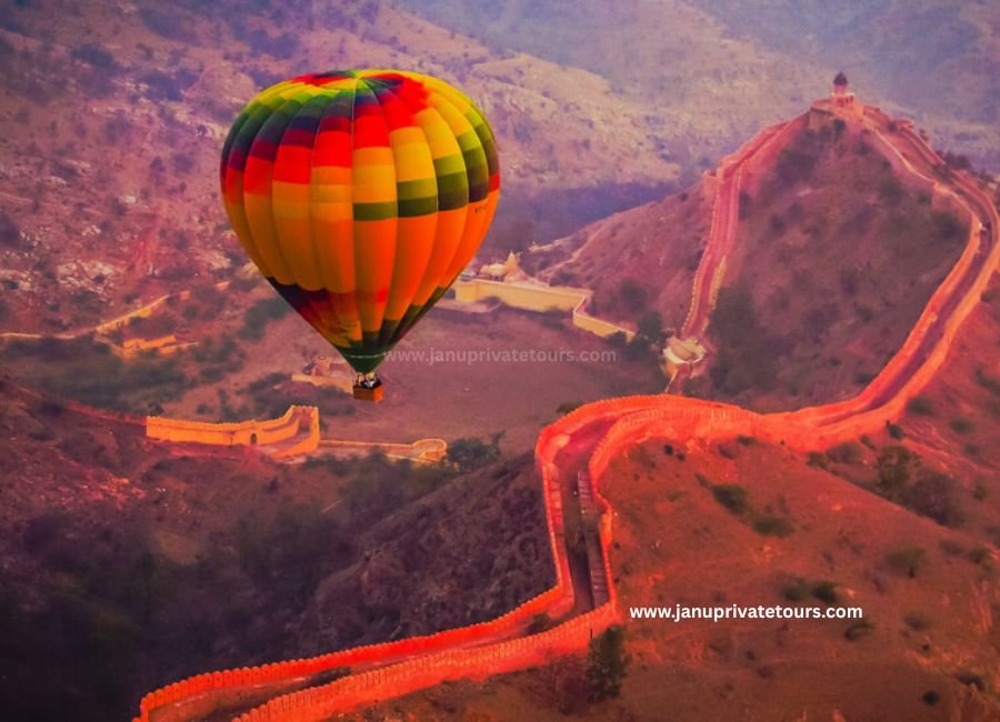 Sunrise hot air balloon ride soaring high above the palaces and Aravalli hills of Jaipur